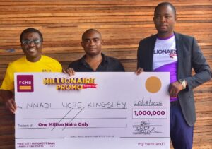 From left: Branch Manager, Orlu, First City Monument Bank (FCMB), Mr. Onuma Ezenwajiego; one of the winners of ₦1 million in the sixth draw of the FCMB Millionaire Promo Season 10, Mr. Nnadi Kingsley and Retail Cluster Head, Awka Zone, FCMB, Mr. Joseph Adejoh, at the cheque presentation ceremony to Kingsley in Orlu, Imo State recently.