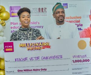 Zonal Head, Wuse, First City Monument Bank (FCMB), Mrs. Kaego Nwachukwu-David, presenting a cheque to Mr. Ifeachor Victor, one of the winners of ₦1 million in the sixth draw of the FCMB Millionaire Promo Season 10 at a ceremony in Abuja recently.