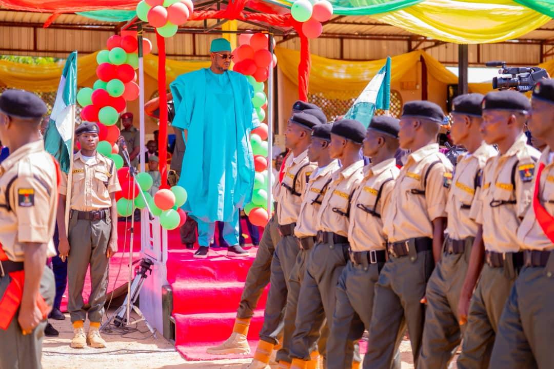 Governor Radda taking salute from the newly commissioned Community Watch Corps in Katsina on Wednesday