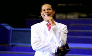 Pastor Chris speaking at a global ministry event following his divorce3