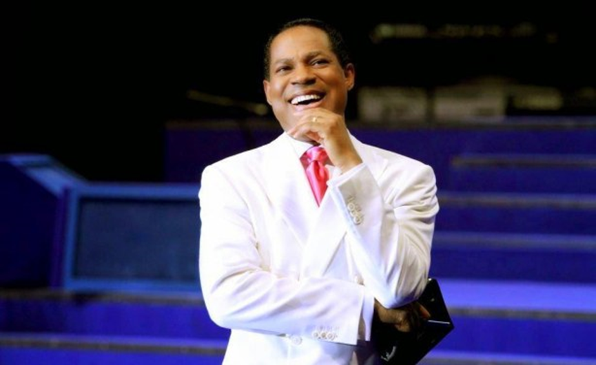 Pastor Chris speaking at a global ministry event following his divorce3