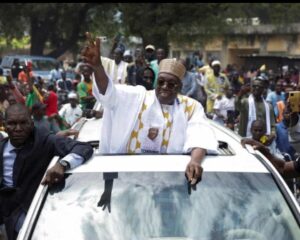 Leading Opposition leader, Issa Tchiroma Bakary, waving victory signs after receiving congratulatory calls from other opposition candidates today