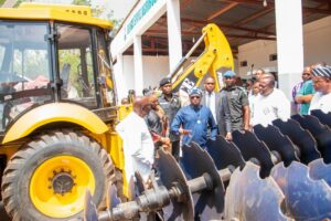 Governor Hyacinth Alia of Benue inspecting some heavy agricultural machines