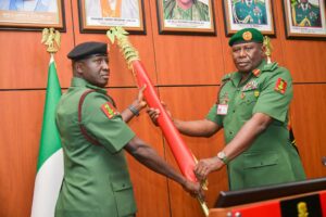 Major General Waidi Shaibu and the incoming Chief of Defence Staff (CDS) Lieutenant General Olufemi Oluyede, right