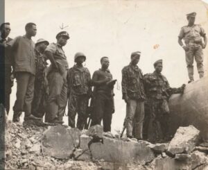 Col. Olusegun Obasanjo of 4th Area Command, Ibadan (Arrowed) inspecting the Ore blown up bridge by the Biafra troops with the war correspondent of the New Nigerian Newspaper Ajayi Memaiyetan (extreme right)