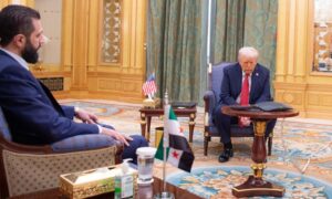 President Donald Trump and Ahmed Al Sharaa (AKA Julani). Photo by Enab Baladi