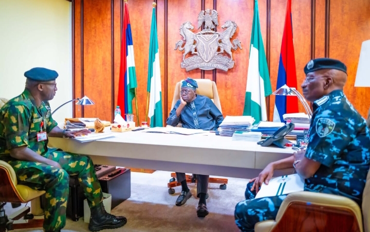 President Tinubu, centre; the Army and Police Chiefs