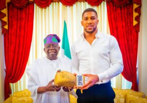 Fil photo of President Tinubu and Anthony Joshua
