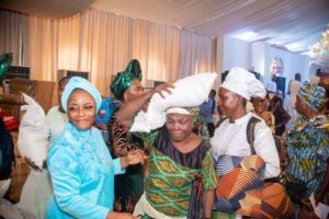 Prophetess Funmilola Lucas with some beneficiaries of the empowerment programme