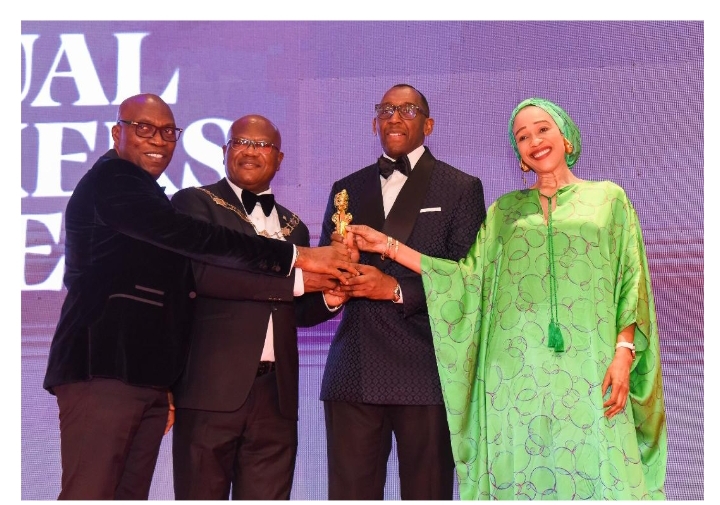 From left: CEO, Cowry Asset Management Limited, Mr. John Chukwu; the President/Chairman of Council of the Chartered Institute of Bankers of Nigeria (CIBN), Professor Pius Olanrewaju; Executive Director, Wholesale Banking, First City Monument Bank (FCMB), Mr. Obaro Odeghe; and the Bank’s Executive Director, Corporate Services & Service Management, Felicia Obozuwa, during the presentation of Best SME Focused Bank Award to FCMB by the CIBN at its Annual Dinner in Lagos.