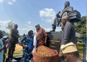 Yemisi Shyllon, Dr Abosede Bamire, Lasisi Olagunju and others at the site of the statue