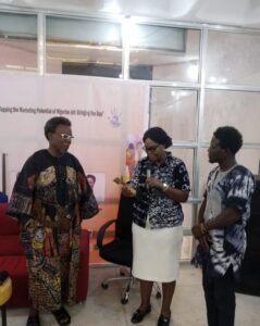 Tola Wewe (far left) receiving an award from Mrs Oriyomi Pamela Otuka and Mr Wale Asubiojo
