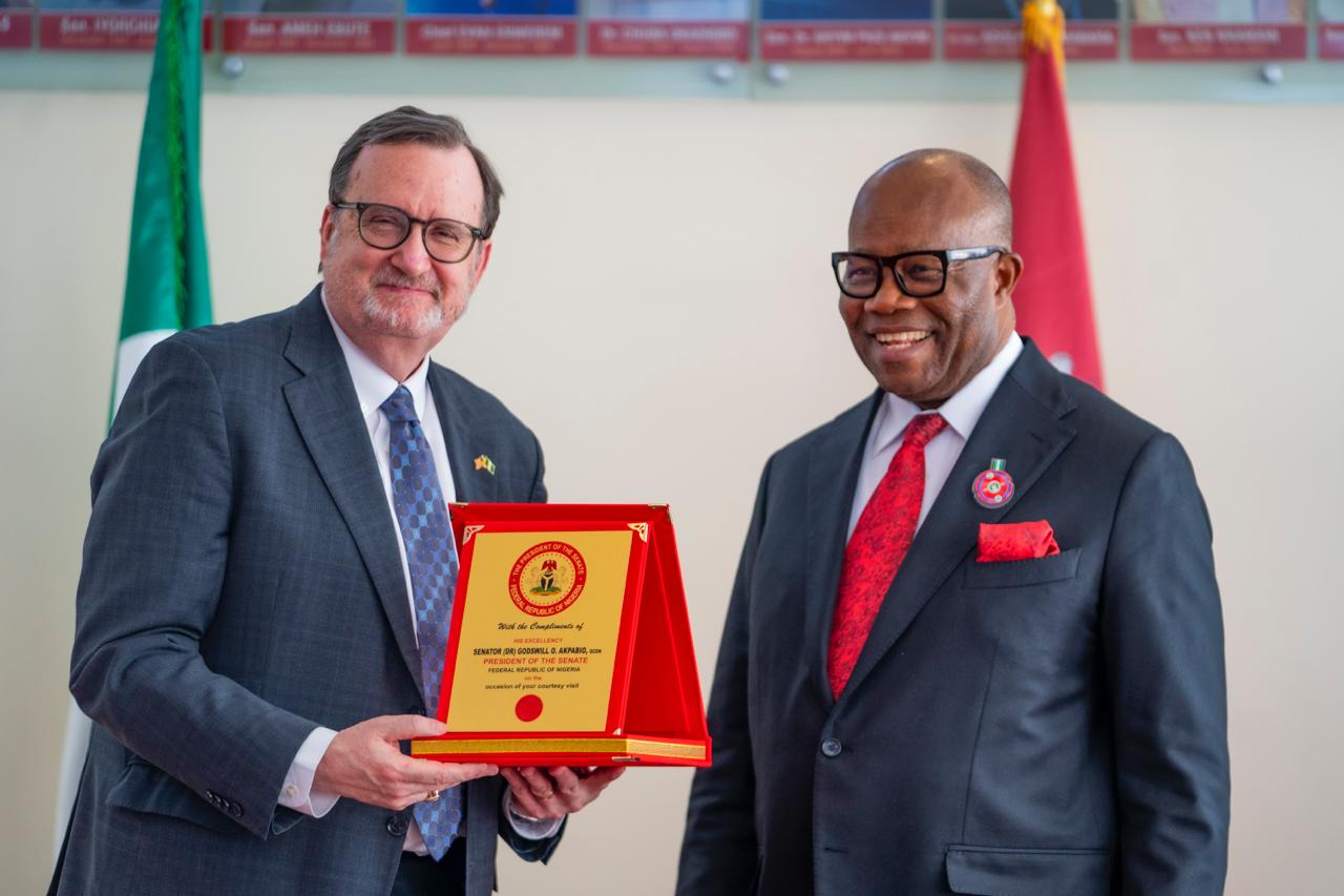 The President of the Senate, Godswill Akpabio and US Ambassador to Nigeria, Richard M. Mills Jnr