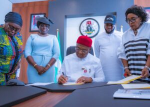 L-R: Acting Chief Judge of Imo State, Justice Ijeoma Agugua, Deputy Governor of Imo State, Lady Chinyere Ekomaru, Governor Hope Uzodimma of Imo State, Deputy Speaker, Imo State House of Assembly, Rt. Hon Amara Iwuanyanwu and the Clerk of the House, Barr. Chinaelo Emeghara, when Governor Uzodimma signed the 2026 Appropriation Bill into law at the Government House Annex, Eziachi Umuna Orlu... Wednesday.