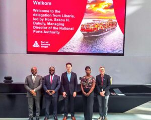 MD NPA, Sekou Dukuly, 2nd left, with his team and officials at the Port of Antwerp, Belgium