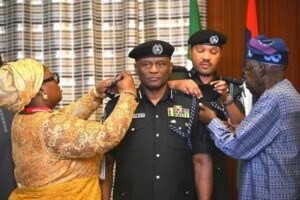 President Tinubu, right and Disu2