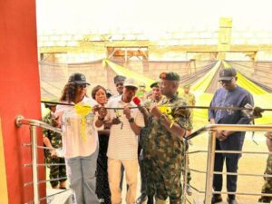 Leke Abejide and Gen. KU Sidi during the housing commissioning
