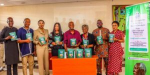 Clark's family and organizers of the event during the unveiling of the book
