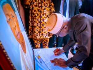 Governor Biodun Oyebanji, signing the condolence register