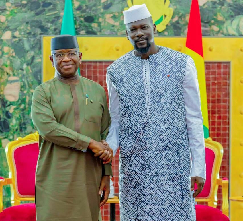 Maada Bio, left, Mamadi Doumbouya, right