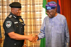 President Tinubu, right, and Tunji Disu