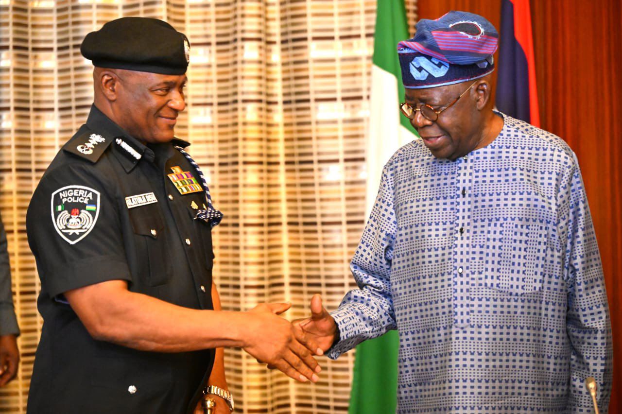 President Tinubu, right, and Tunji Disu