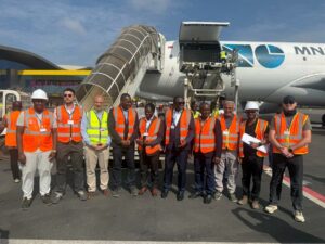 Sierra Leone’s Finance Minister, Sheku Ahmed Fantamadi Bangura, 6th from left, with some officials at Lungi int airport, to receive construction materials today
