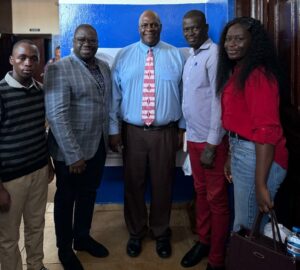 Dr Sylvester Davidson Nicol, center, with some officials, after launching the foundation