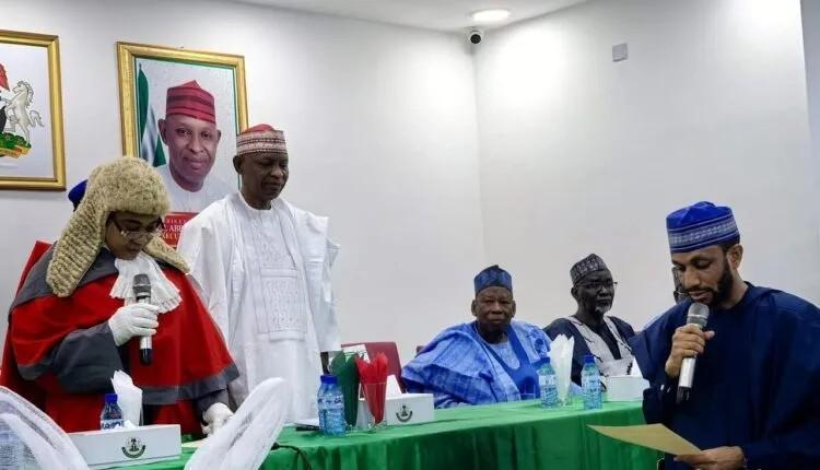 Murtala Sule Garo taking Oath of Office as the new Kano Deputy Governor, while Governor Yusuf and immediate past National chairman of APC, Dr. Abdullahi Umar Ganduje watch with keen interest