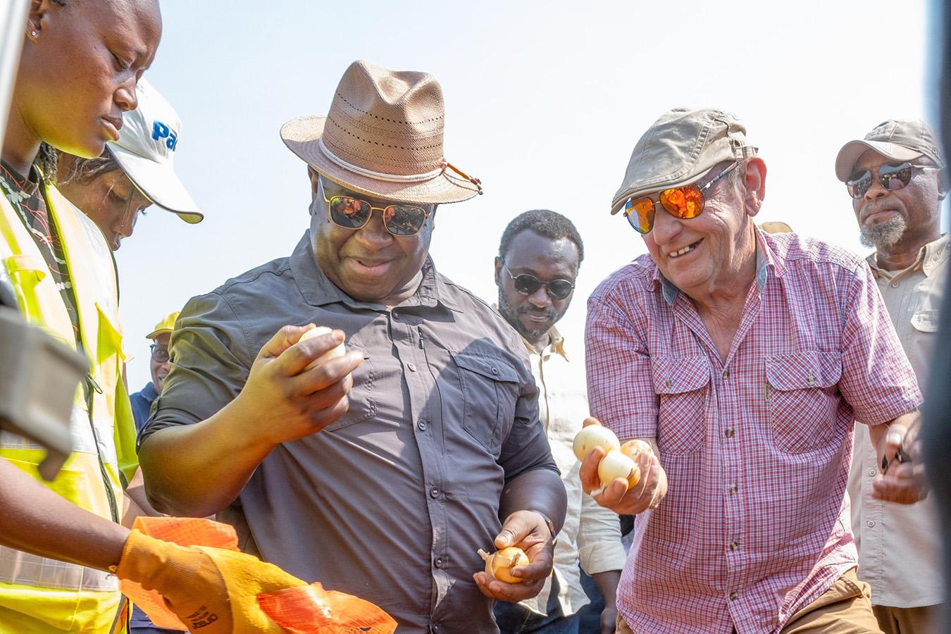 •President Bio observing locally produced onions