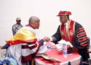 Prof Ehiyamen Mediayanose Osezua exchanges pleasantries with the Vice Chancellor, Prof Temi Emmanuel Ologunorisa